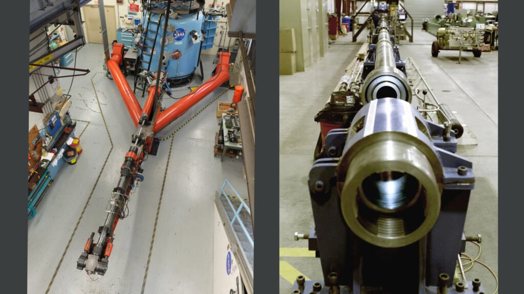 The angled barrel of NASA's Ames Vertical Gun Range mounted inside its test building at Moffett Field.